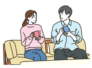 屋内で寄り添うアジア人のカップル
