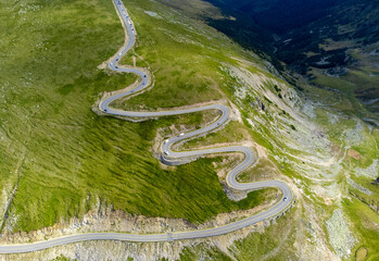 Aerial landscape with spectacular serpentines of the Transalpina road in the Parang mountains - Romania
