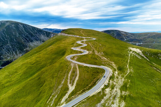 Aerial view of the spectacular Transalpina road with many serpentines crossing the Carpathian mountains at high altitude