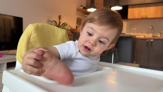 Adorable child in the highchair