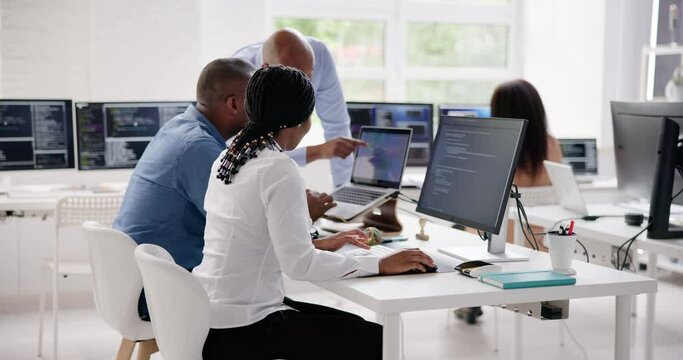 African Business Team Working On Computer
