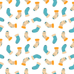 Autumn seamless pattern with warm socks