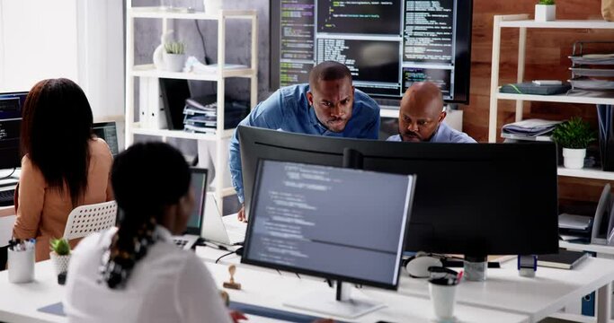 African Business Team Working On Computer