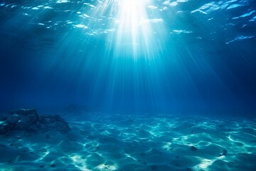 A Mystical Underwater Experience: Deep Blue Sea and Beautiful Light Rays with Sandy Floor Background. Generative AI