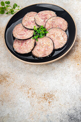 meat sausage pork Andouille (pork stomach, pork neck, offal) ready to eat healthy meal food snack on the table copy space food background rustic top view