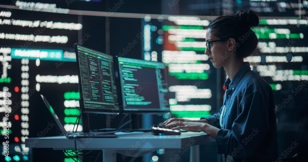 Aufkleber Female Developer Thinking and Typing on Computer, Surrounded by Big Screens Showing Coding Language. Professional Programmer Working in an Office, Running Coding Tests. Futuristic Programming