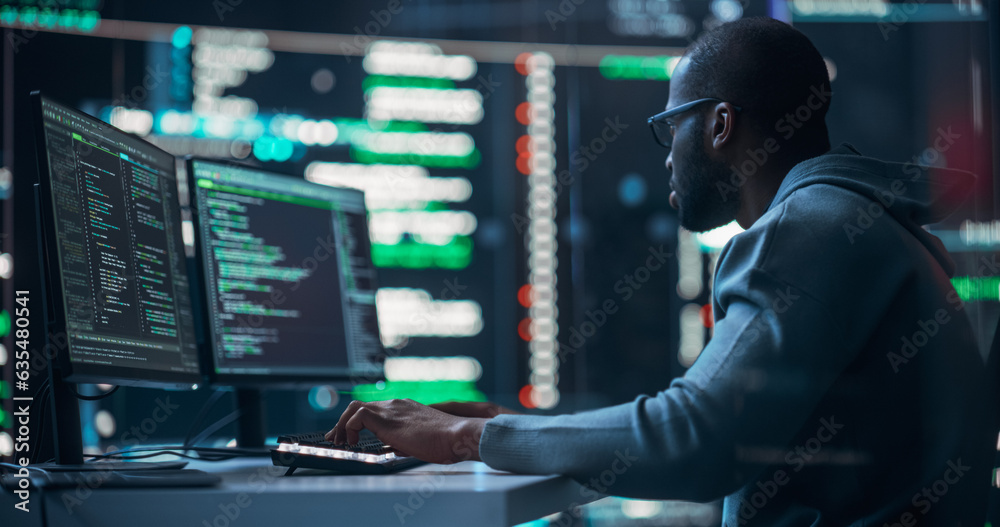 Aufkleber Black Male Programmer Working in Monitoring Room, Surrounded by Big Screens Displaying Lines of Programming Language Code. Portrait of Man Creating a Software. Abstract Futuristic Coding Concept