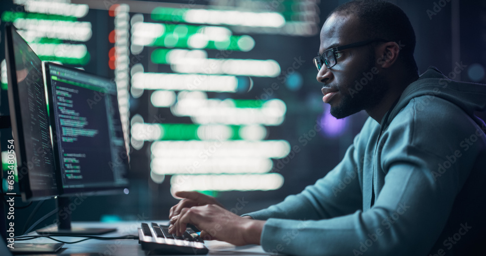 Fototapete Black Male Programmer Working in Monitoring Room, Surrounded by Big Screens Displaying Lines of Programming Language Code. Portrait of Man Creating a Software. Futuristic Coding Concept.