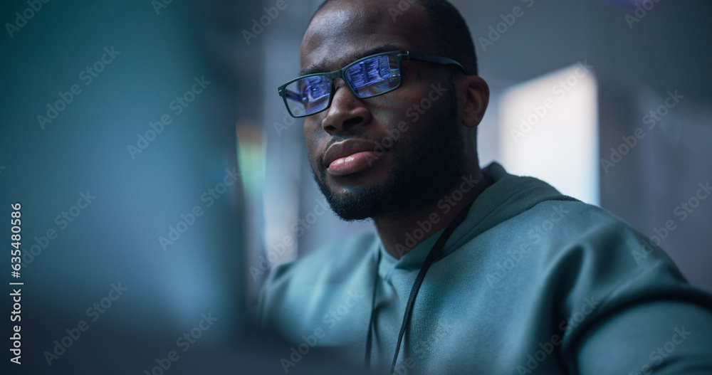 Poster Close Up Portrait of Black Man Working on Computer, Lines of Code Language Reflecting on his Glasses. Male Programmer Developing New Software, Managing Cybersecurity Defence Project.
