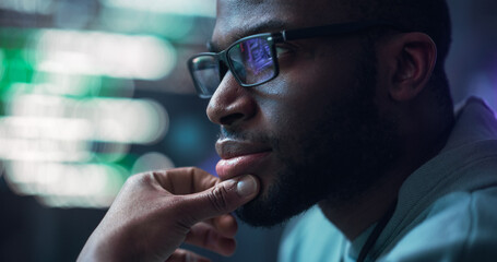 Close Up Portrait of Male Programmer Developing New Software, Coding, Managing Cybersecurity...