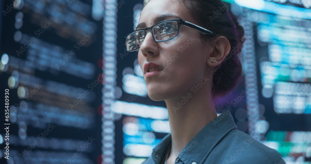 Aufkleber Close Up Portrait of Woman Working on Computer, Lines of Code Language Reflecting on her Glasses from Big Display Screens. Female Programmer Developing New Software, Coding, Managing Cybersecurity