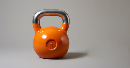 3d orange kettlebell with a silver metal style