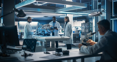 Thrust Engine Engineer, Project Manager and Machinery Operator Work on a Futuristic Turbine Motor,...