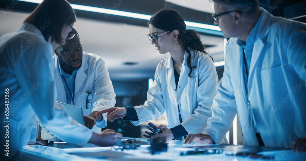 Poster Portrait of a Group of Industrial Robotics Engineers Working on Humanoid Robot, Consulting with Specialists, Analyzing Electronic Components. Female Scientist Having a Meeting with Her Team.