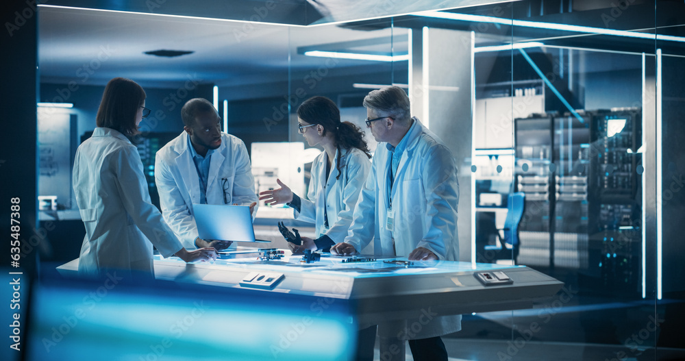 Poster Team of Tech Scientists Having a Group Meeting in Research and Development Facility at a Robot Manufacturing Factory. Engineers Examining an Innovative Robotic Bionic Hand Concept.