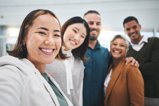 Selfie, portrait and group of business people smile in office for support of global team building. Diversity, employees and face asian woman with friends for profile picture about us on social media