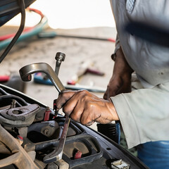 mechanic changing car components