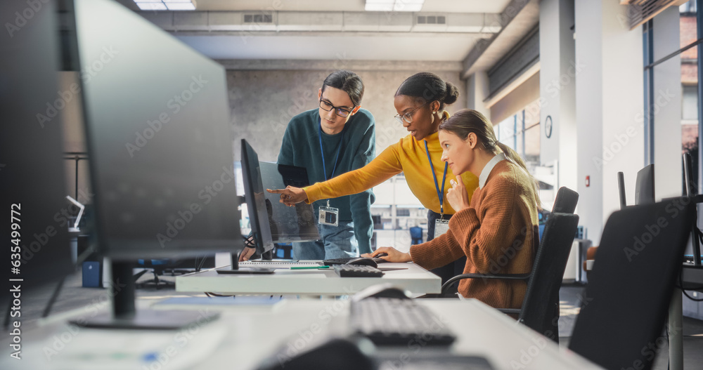 Poster Team of Diverse Female and Male Students Having a Conversation in Computer Class, Working on a College Assignment. Young Classmates Talking, Thinking About a Successful Software Development Project