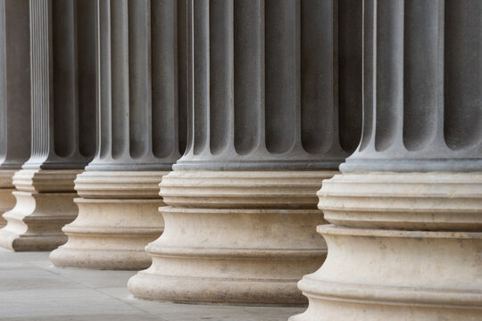 Colonnade of Ionic order columns, close up.