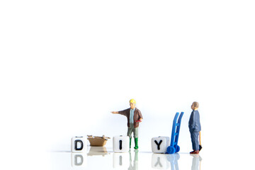 diy word or concept made by white letter cubes on white and gray background, do it yourself...
