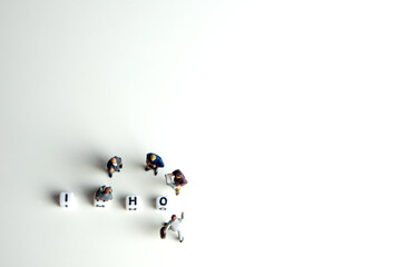 imho word or concept made by white letter cubes on white and gray background with miniature...
