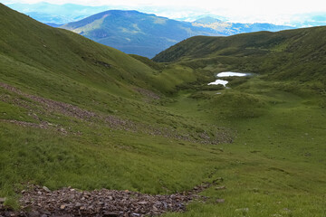 Naklejka premium landscape with lake in the mountains