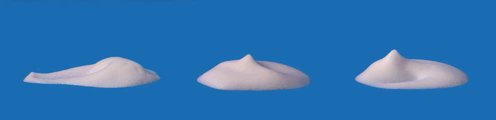  Foam texture, white bubbles from soap or shampoo or shower gel and facial foam. isolated on blue background