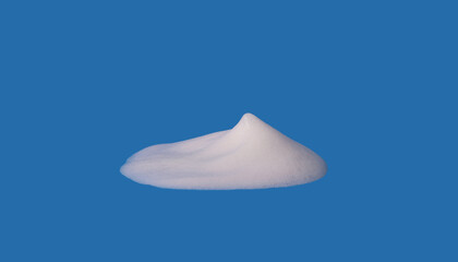  Foam texture, white bubbles from soap or shampoo or shower gel and facial foam. isolated on blue background