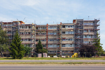 An old communist building is being renovated during the summer