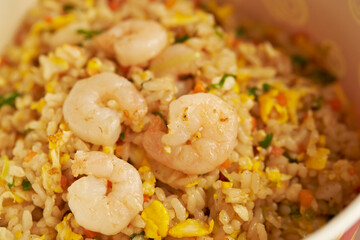 Shrimp and egg fried rice on a plate