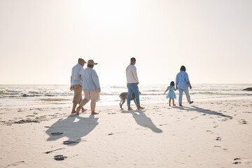 Summer, travel and walking with big family on beach for vacation, bonding and love. Freedom, care...