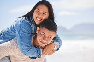 Summer, piggyback and portrait of a couple at the beach for a date, love or vacation together. Mockup, smile and a man and woman with a hug at the sea for a holiday, travel or bonding in marriage