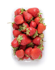 Plastic container with fresh strawberry on white background