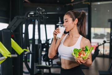 sport healthy woman drinking milk and vegetable good source of whey protein and vitamin for muscle...