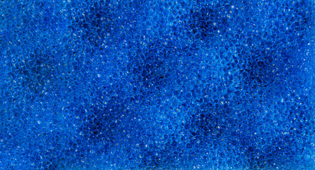 Texture of a blue bathing sponge