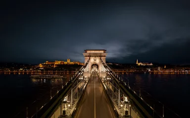 Foto op Plexiglas Kettingbrug Renovated Szechenyi Chain bridge in Budapest Hungary.  Replaces all old and damaged bricks, all iron component, and the full light system.  The Chain bridge one of the famous sights in Budapest