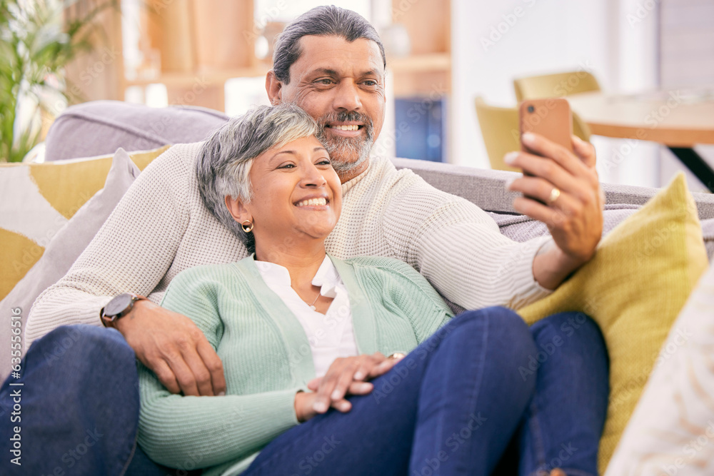 Sticker Selfie, happy and mature couple on couch with smile for social media post, profile picture and memories. Marriage, love and man and woman take photo in living room for bonding, relationship and relax