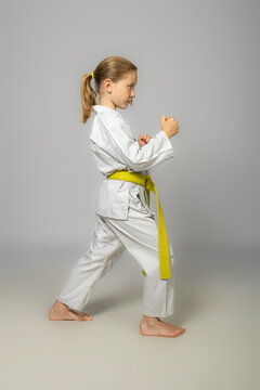child practises martial arts