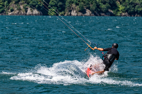 Close-up of a kitesurfer on Lake Como