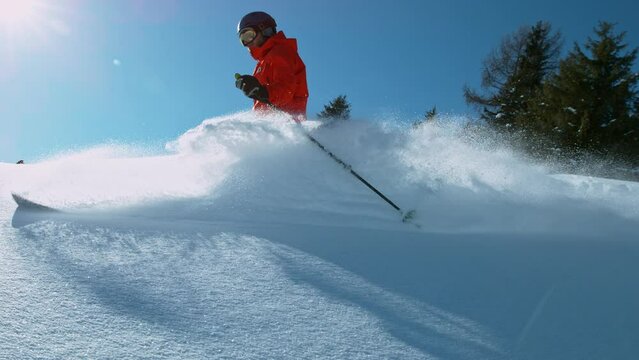 Super Slow Motion of Free Ride Skier in Powder Snow. Filmed on High Speed Cinema Camera, 1000fps. Speed Ramp Effect.