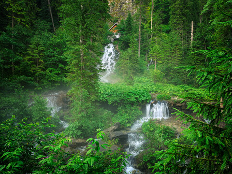 Summer landscape of Seven Springs Waterfall in Bucegi Mountains, Romania, Europe