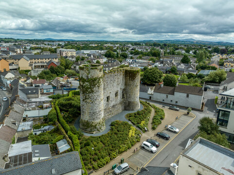 Aerial view of Carlow castle and town in Ireland with circular towers above the river Barrow