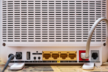 Back panel of network Wi-FI router with empty not connected lan ports