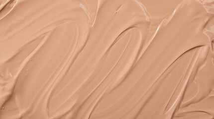 The base of the foundation is smeared as a sample background close-up. Makeup cosmetics. Concealer....