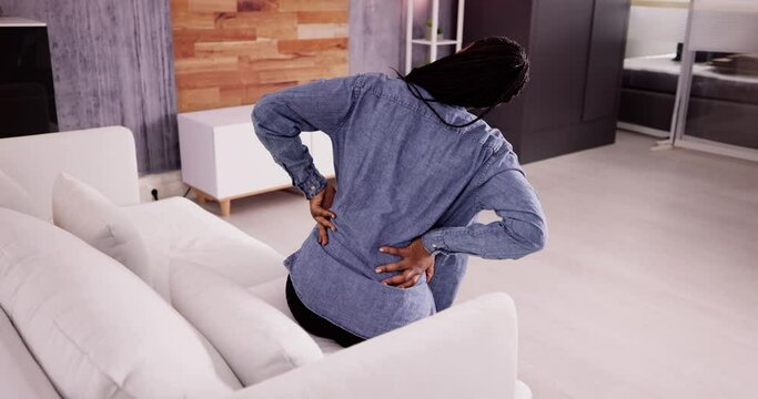Woman Having Back Pain Or Backache