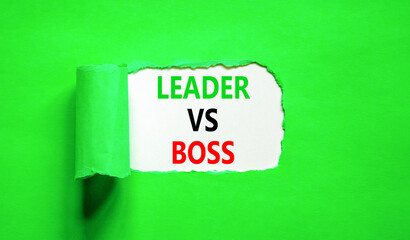 Boss vs leader symbol. Concept words Boss vs versus leader on beautiful white paper. Beautiful green background. Business motivational boss vs leader concept. Copy space.
