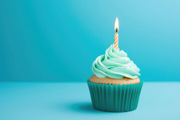 Joyful Birthday Cupcake Illuminated by a Candle