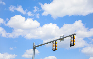 Illuminating pathways and guiding traffic, street lights and traffic lights symbolize safety, order, and urban connectivity