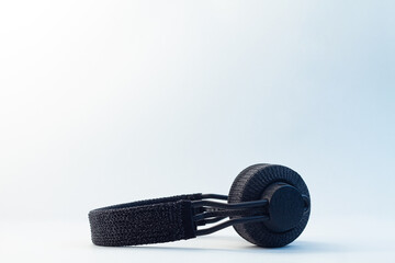 Black bluetooth headphones on a isolated background