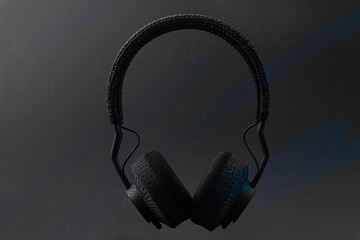 Black bluetooth headphones on a isolated background
